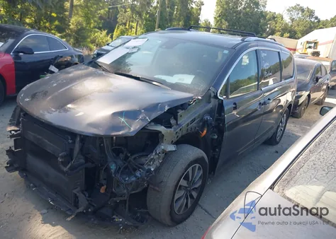 2021 Chrysler Pacifica Hybrid Touring L z USA, uszkodzony, nr VIN 2C4RC1L79MR602839